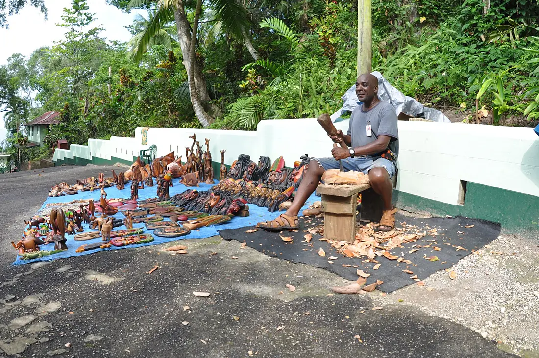 A Dunns River craftsmen carving wood Photo Don Ramey Logan