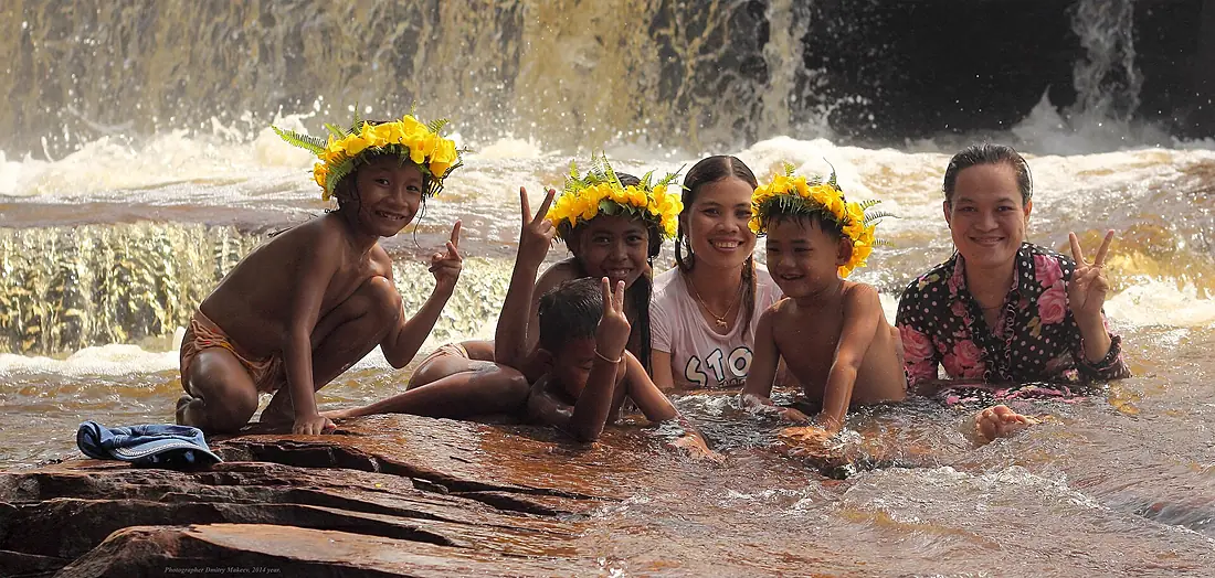 Bathing in the waters of the waterfall Kbal Chhay