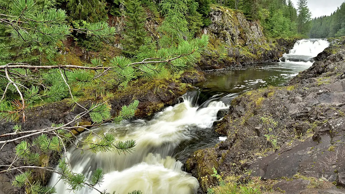Between the cascades of the Kivach waterfall