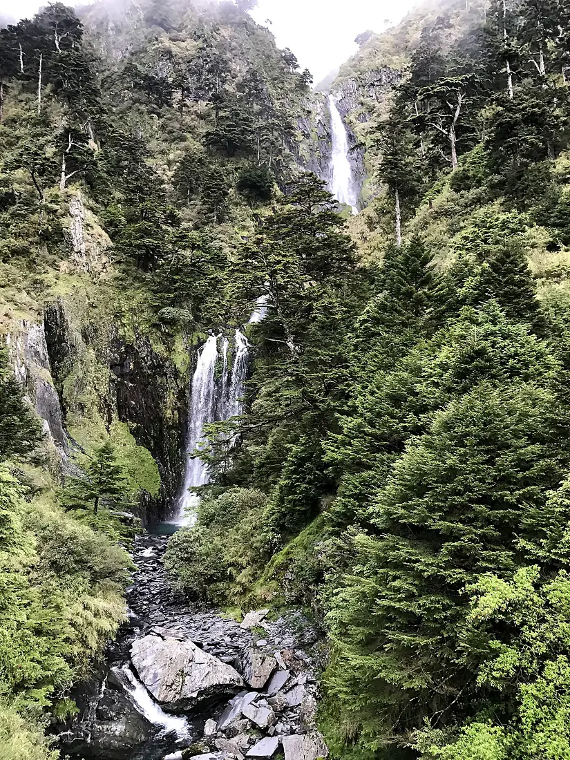 Looking up at Nenggao Waterfall