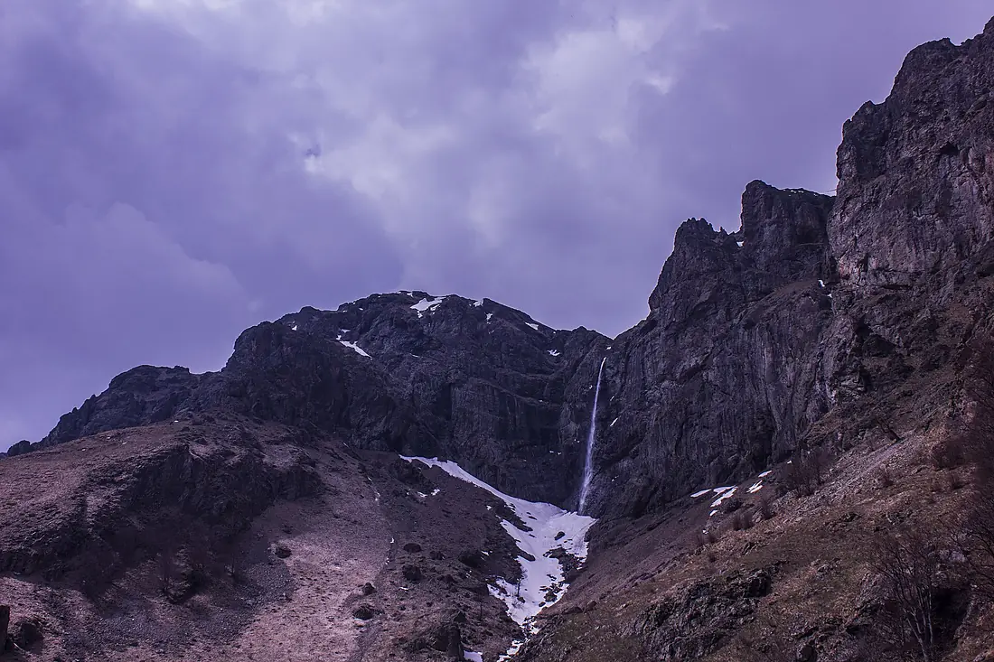 Beneath the waterfall