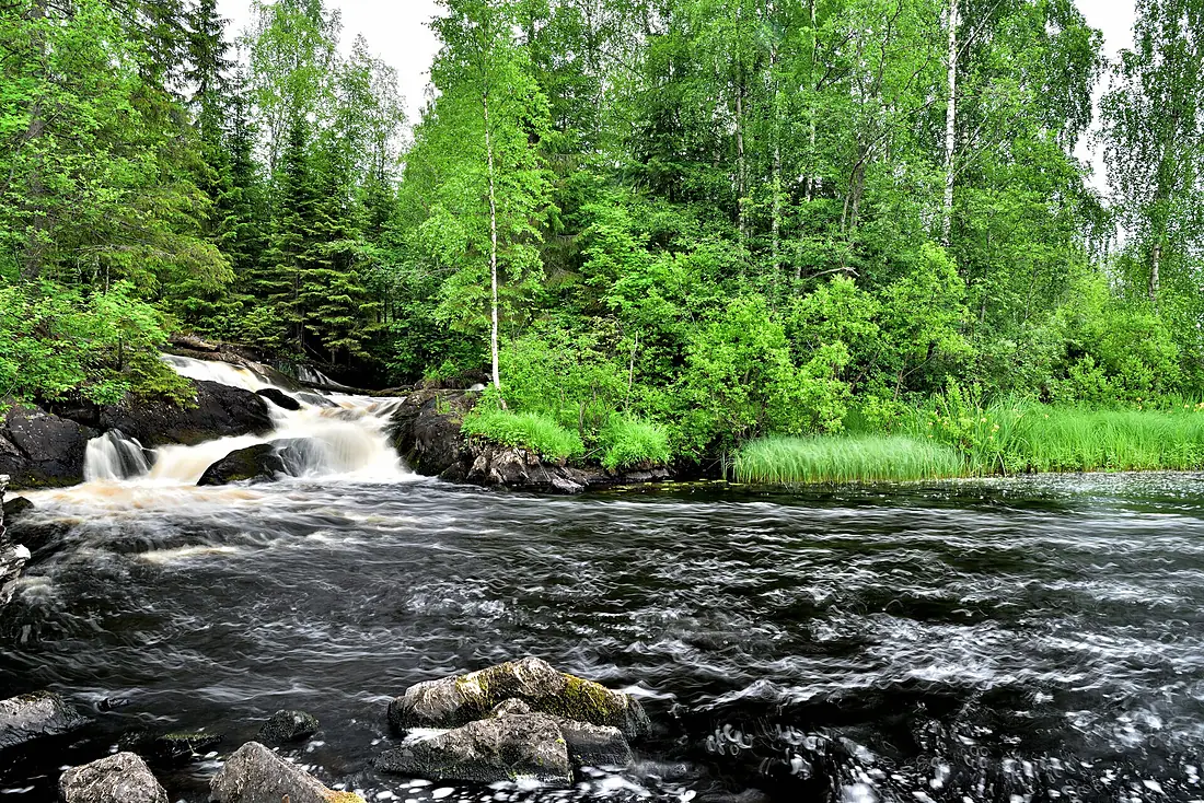 Severo-Priladozhsky reserve. Ruskeala waterfall and the water of the Tohmajoki river