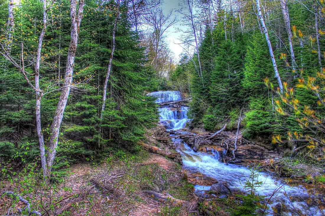 Gfp-michigan-pictured-rocks-national-lakeshore-far-view-of-sable-falls